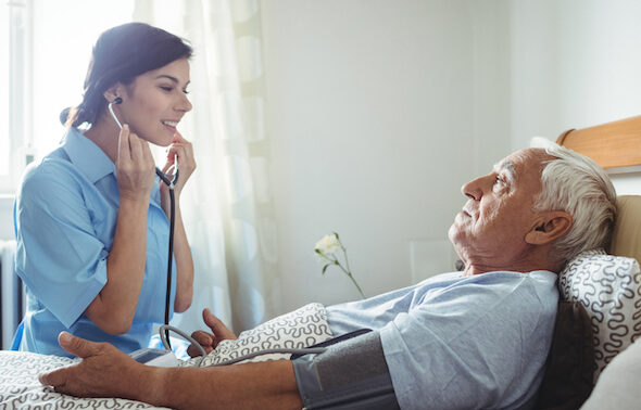 nurse taking care of resident
