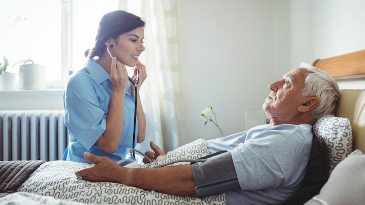 nurse taking care of resident