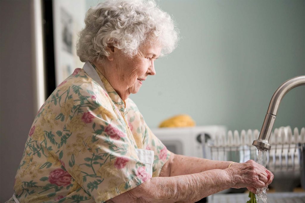 resident washing dishes
