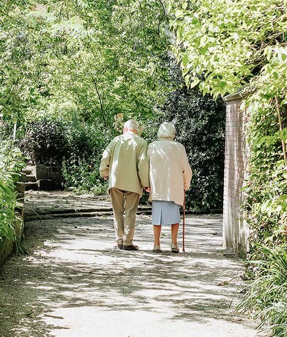 residents walking in the garden