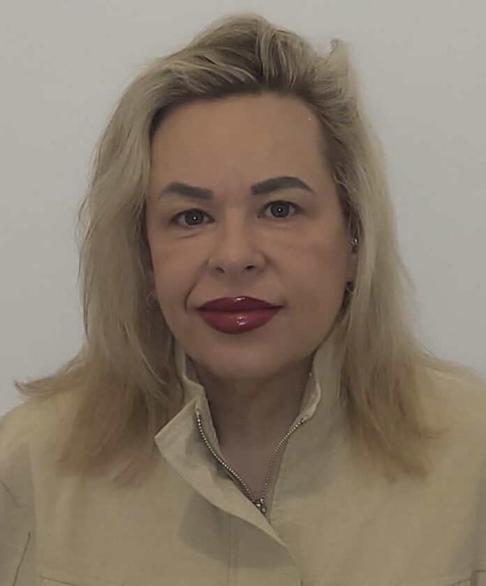 blonde woman in a white shirt